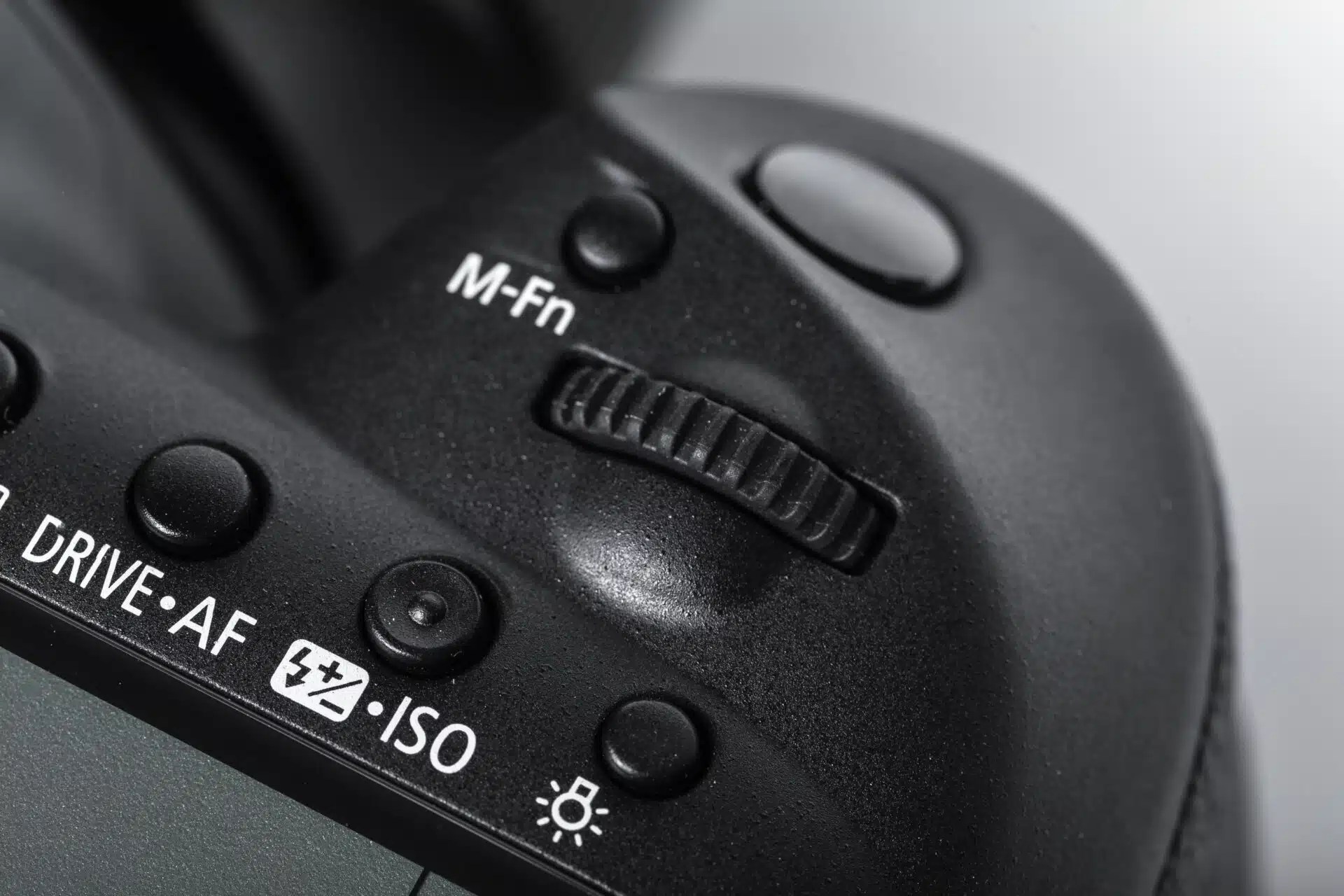 What Is Noise In Photography? 2 A close-up image of a camera's settings.